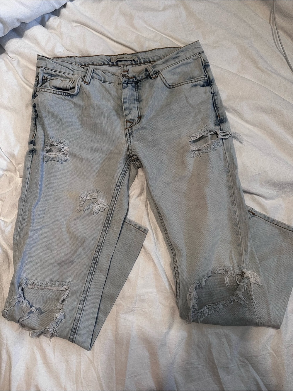 Light Wash Distressed Ripped Jeans